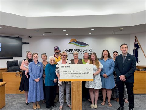 Community Financial Assistance Grants - signing ceremony.png